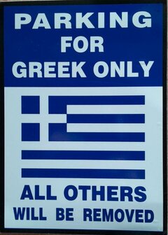 Bord &quot;PARKING FOR GREEK ONLY&quot;